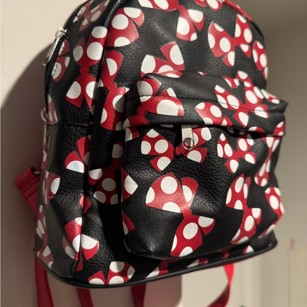 Disney Black Backpack with Red & White Bow Pattern